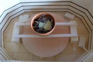 Figure 2...Drop Pot filled with glass and suspended in kiln.